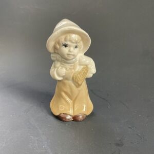 Vtg Figurine of Harvest Boy Or Girl Holding‎ Wheat Leaning Forward White Shirt